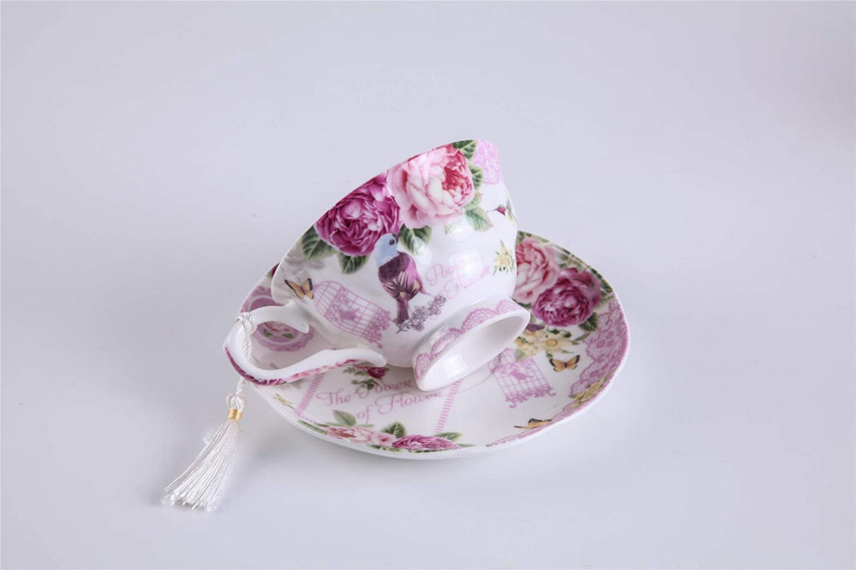 Elegant floral porcelain tea cup and saucer set ideal for showcasing on a cake stand