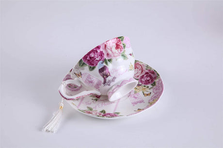 Elegant floral porcelain tea cup and saucer set ideal for showcasing on a cake stand