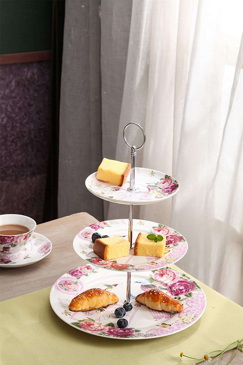 Elegant three-tiered Cake Stand from London Boutique Lifestyle displaying pastries and desserts