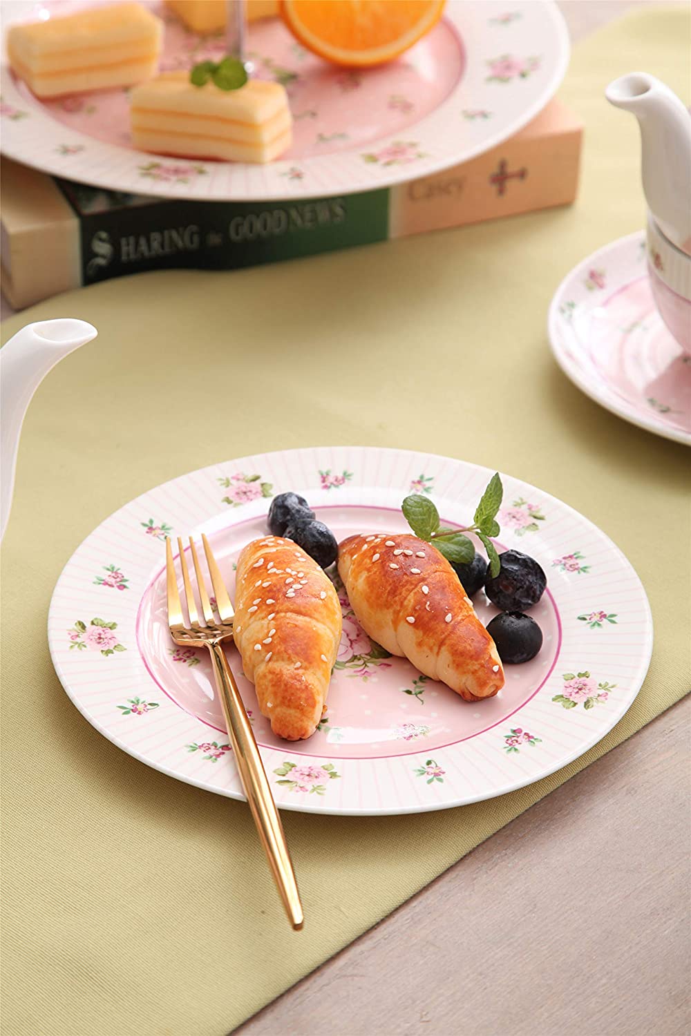 Elegant Cake Stand featuring floral design, perfect for serving pastries and desserts at gatherings