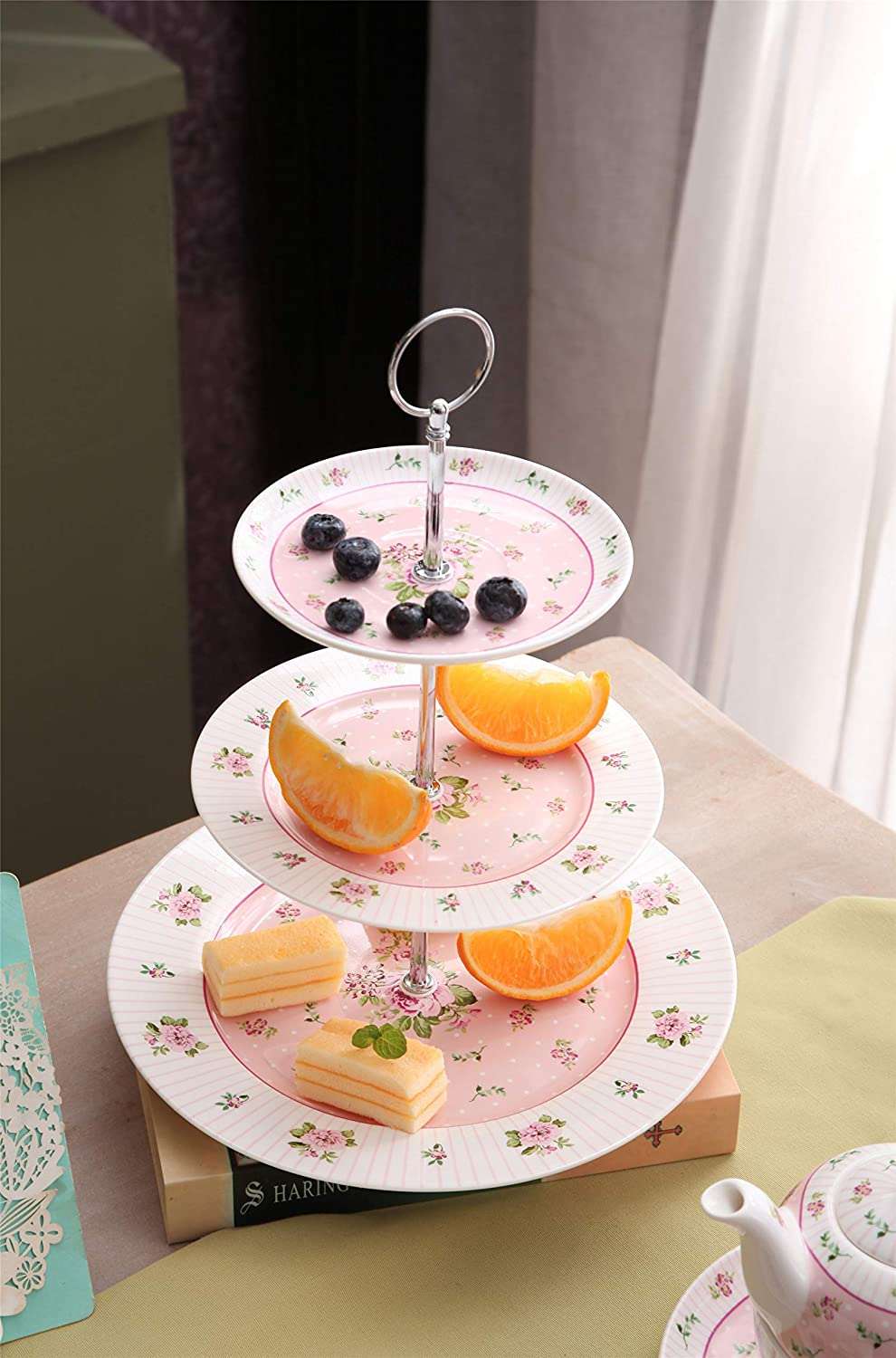 Elegant three-tiered Cake Stand in pastel floral design with fruits and pastries displayed