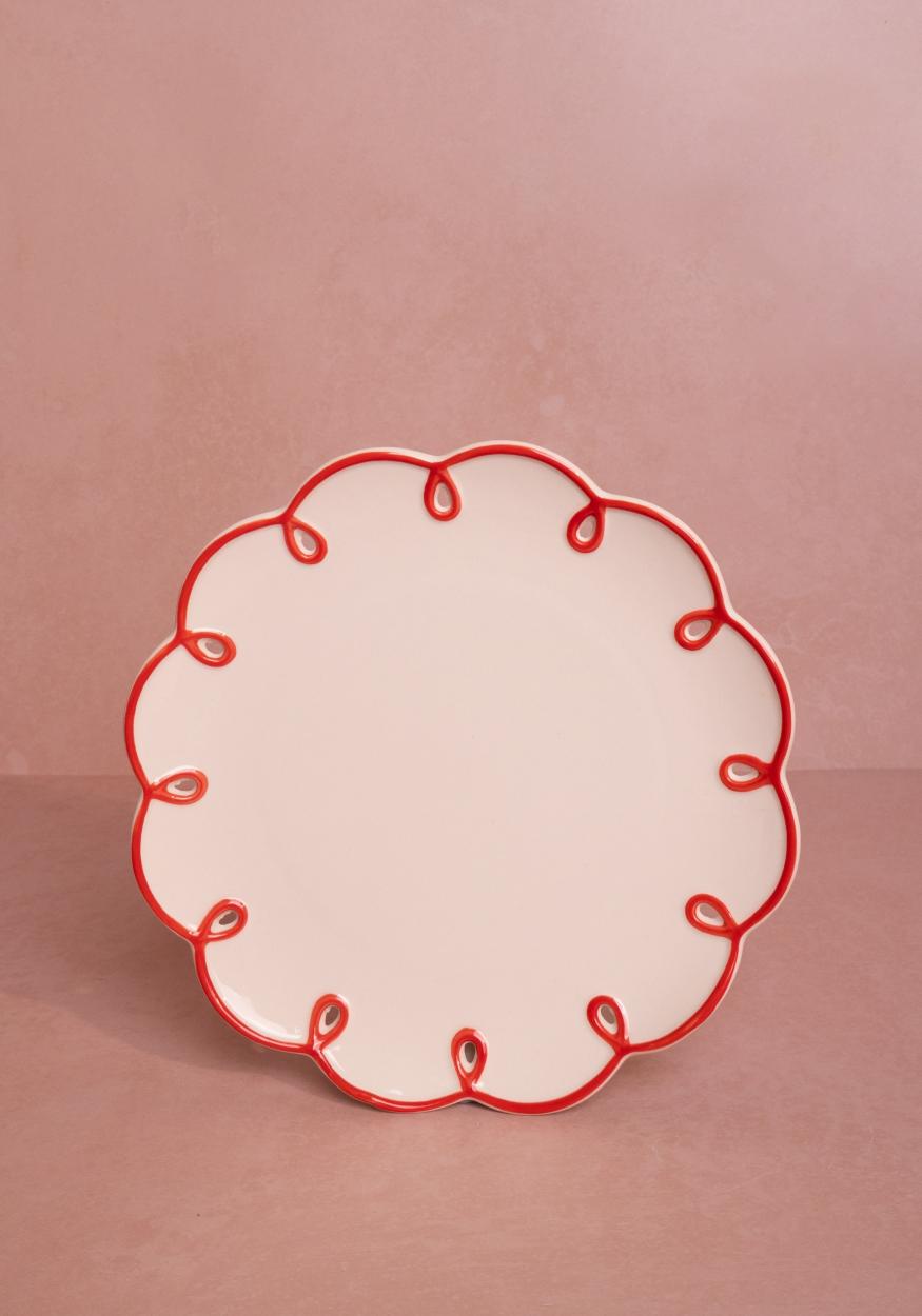 Casa by Josephine Jenno lunch plate with a decorative red scalloped edge for elegant dining