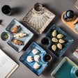 Nisu Home Decorative Plates Set Displaying Assorted Sushi and Dumplings on Elegant Tableware