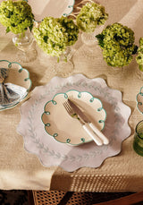 Elegant Casa by Josephine Jenno side plates with decorative edges on a beautifully arranged dining table