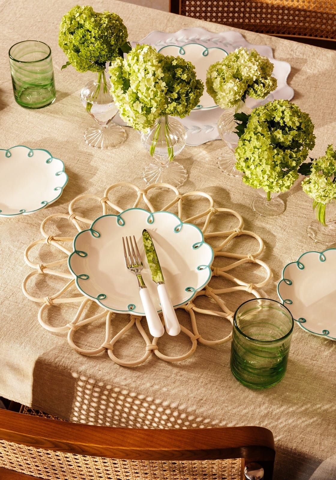 Casa by Josephine Jenno side plates with scalloped edges on a beautifully set dining table