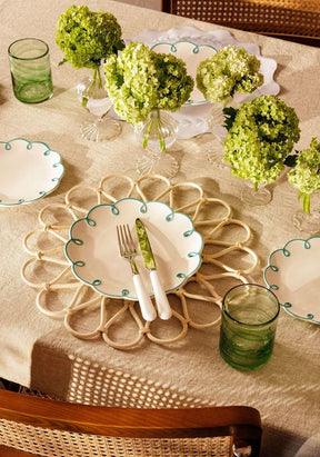 Casa by Josephine Jenno side plates with scalloped edges on a beautifully set dining table
