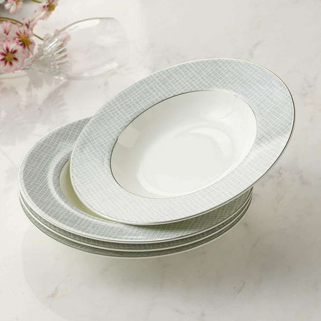 Set of four elegant soup bowls with a fine grey pattern and gold rim detailing
