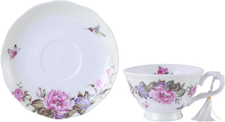 Elegant floral tea cup and saucer set featuring roses and hummingbirds, perfect for afternoon tea