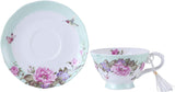 Elegant floral tea cup and saucer set featuring pastel colours and intricate designs with butterflies