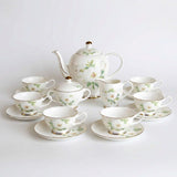 Elegant KitchBoom Tea Set featuring floral design with teapot, cups and saucers for afternoon tea