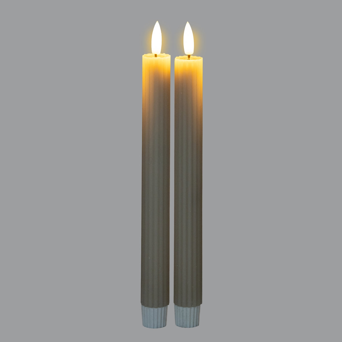 Elegant two-pack of Shades 4 Seasons taper candles with a warm glow ideal for home decoration