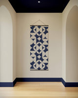 Geometric Printworks tapestry in blue and cream, perfect for modern home decor