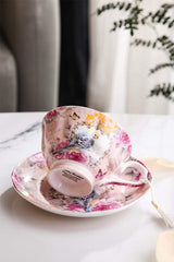 Delicate tea cup with floral design and bird illustrations, perfect for enjoying your favourite brew