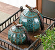 Elegant Nisu Home Tea Jar Set in Turquoise with Unique Textured Finish and Decorative Tassels