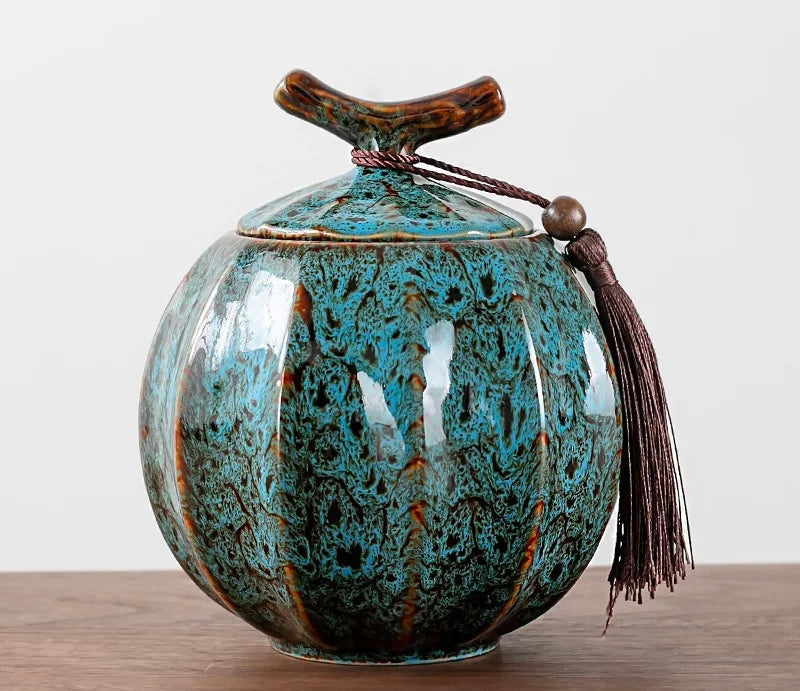 Nisu Home Tea Jar in turquoise with a unique textured finish and decorative tassel