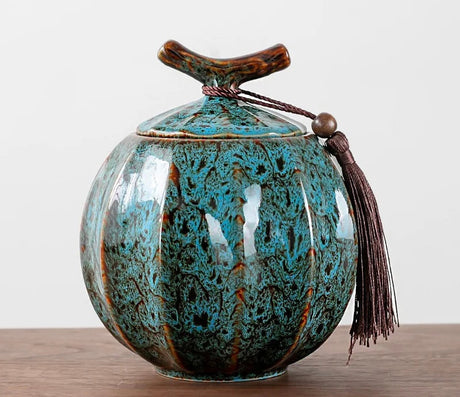 Nisu Home Tea Jar in turquoise with a unique textured finish and decorative tassel