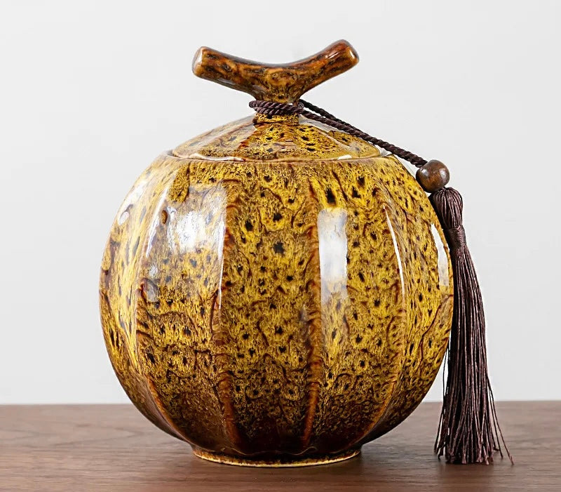 Nisu Home Ceramic Tea Jar with a Unique Design and Decorative Tassel for Stylish Tea Storage