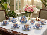 KitchBoom Tea Set featuring a floral teapot and cups, perfect for elegant tea gatherings