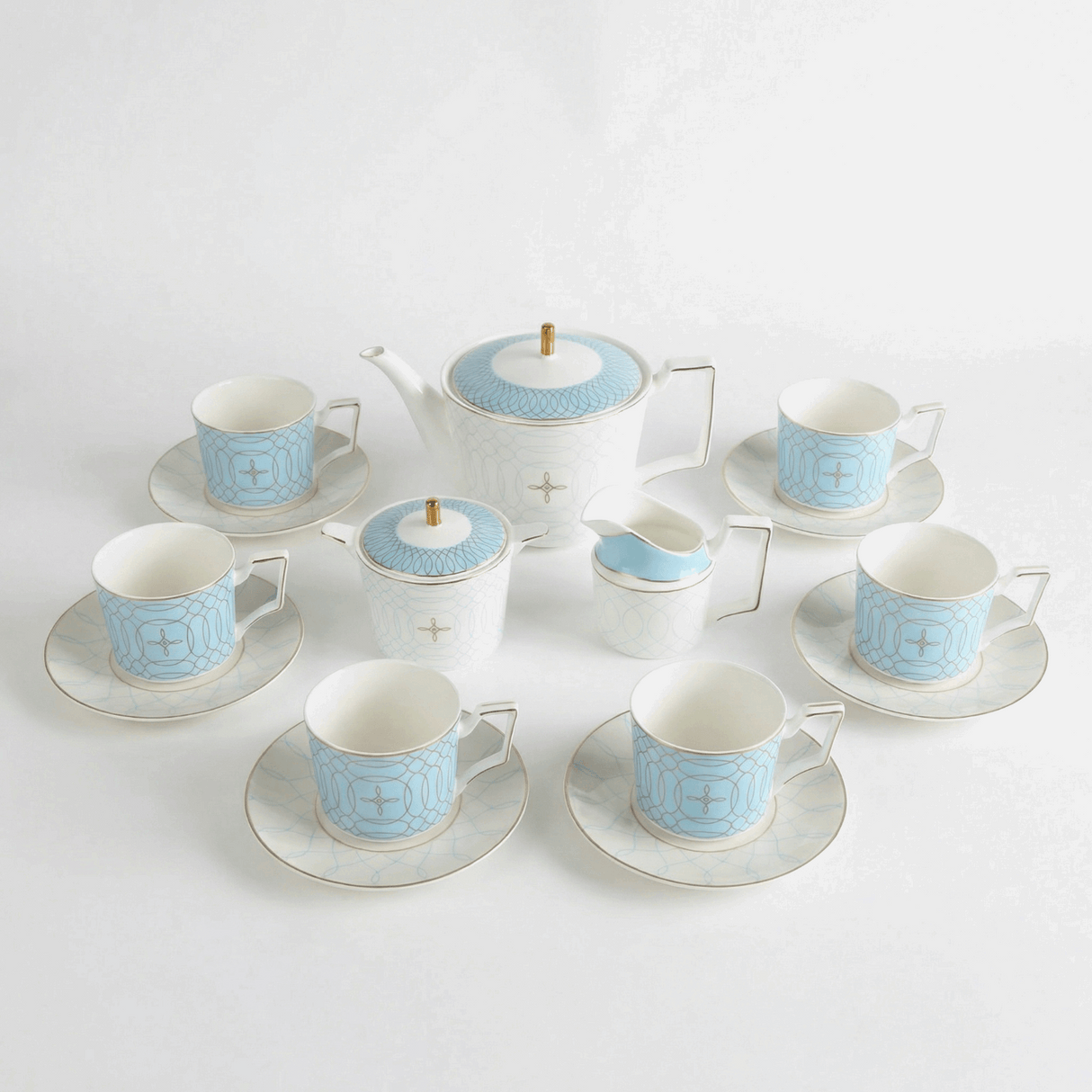 Elegant KitchBoom Tea Set with Blue and White Design, Includes Teapot, Cups, and Saucers