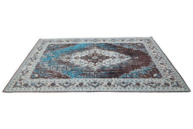 Orsina Teal Rug with intricate patterns and a vintage design suitable for home decor