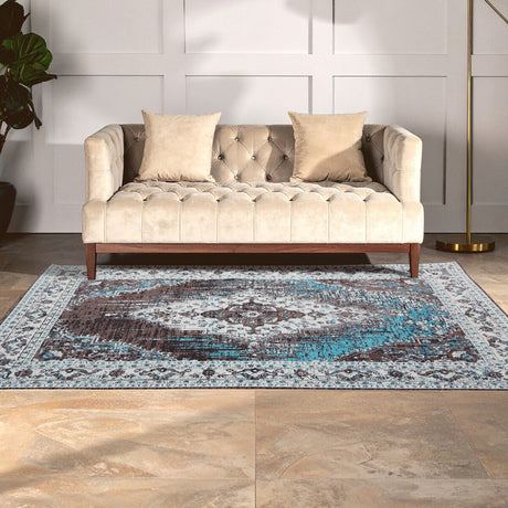 Orsina Teal Rug with intricate patterns, enhancing the elegance of a modern living room decor