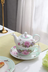 Elegant floral teapot with a matching saucer from London Boutique Lifestyle for tea lovers