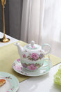 Elegant floral teapot with a matching saucer from London Boutique Lifestyle for tea lovers