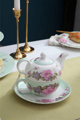 Elegant London Boutique Lifestyle teapot with floral design and matching saucer, perfect for afternoon tea