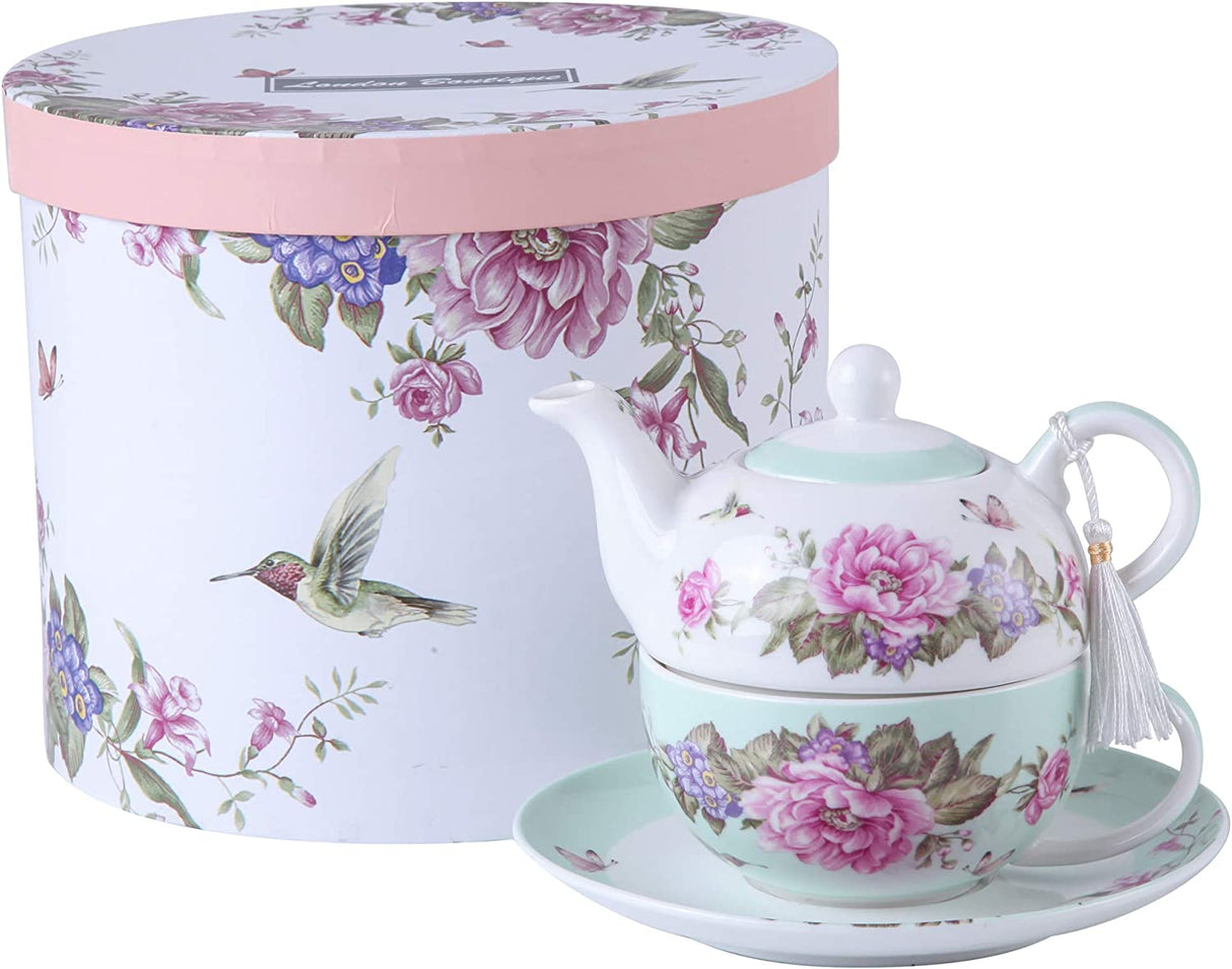 Elegant floral teapot set with matching cup and saucer, presented in a decorative gift box
