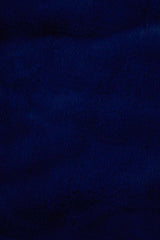 Orsina Fur Throw in deep navy blue for stylish warmth and comfort on chilly evenings