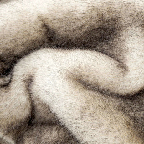 Soft and cosy faux fur throw by Nisu Home in neutral tones for added comfort and style