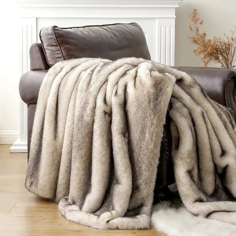 Soft Nisu Home Throw in Grey, Perfect for Adding Warmth to Any Living Space