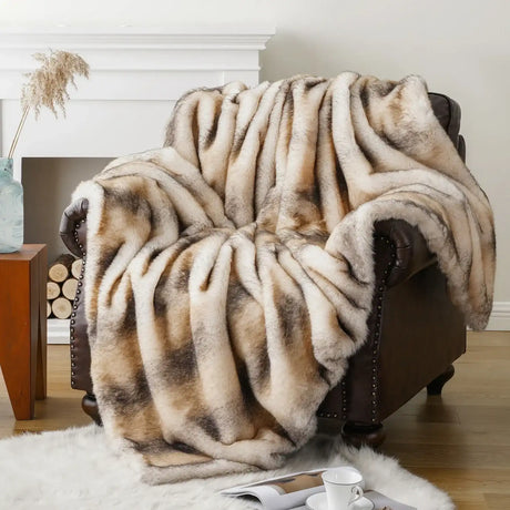 Soft and luxurious Nisu Home throw draped over a cosy armchair for added warmth and style
