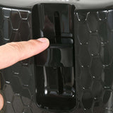 Close-up of a finger pressing the lever on a Wise Galleria Toaster Set for easy bread toasting