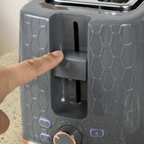 Close-up of Wise Galleria Toaster Set control panel with a finger adjusting settings