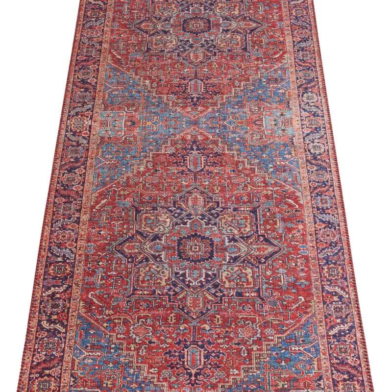 Amata Rug featuring intricate patterns in rich red and blue tones for stylish home decor