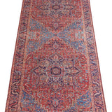 Amata Rug featuring intricate patterns in rich red and blue tones for stylish home decor