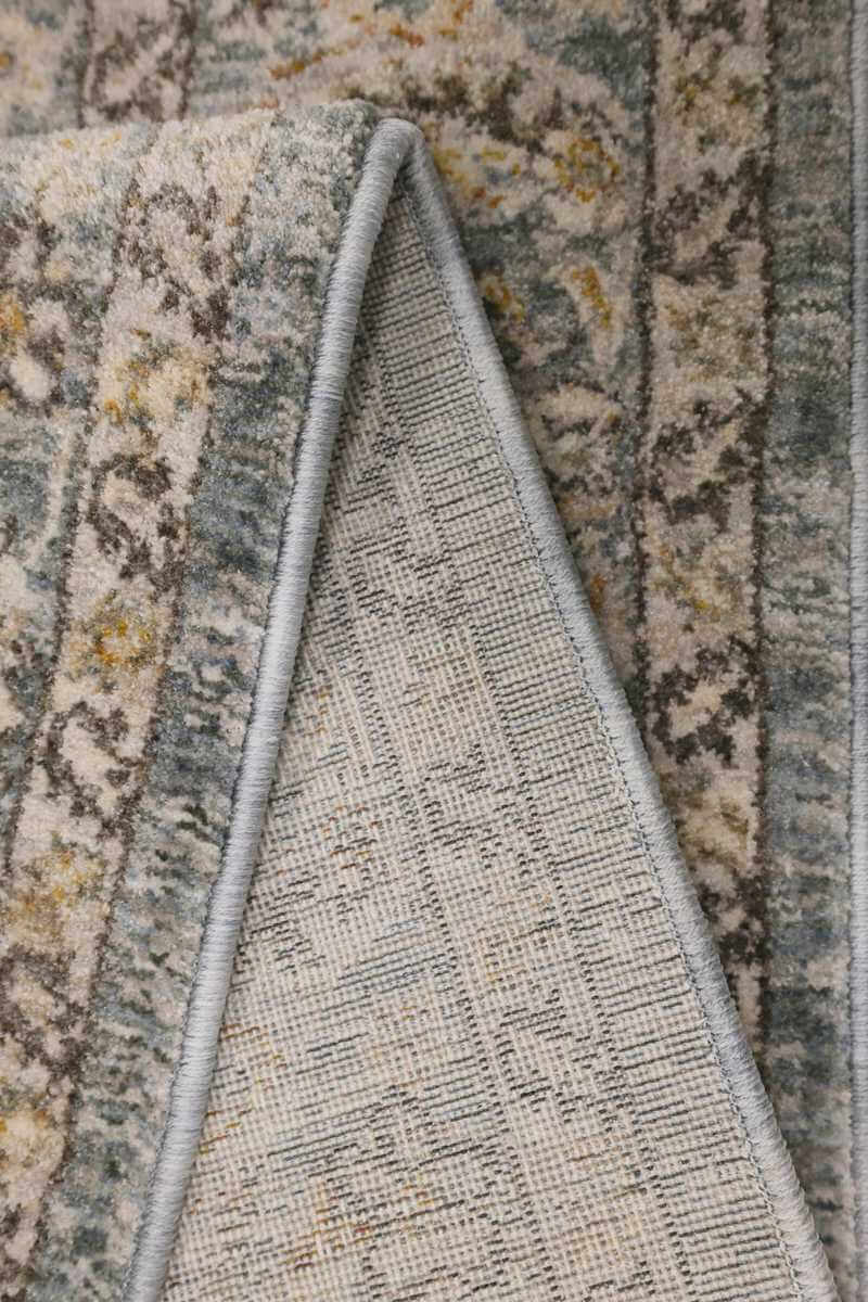 Close-up of a beautifully detailed traditional rug with a patterned design and soft texture