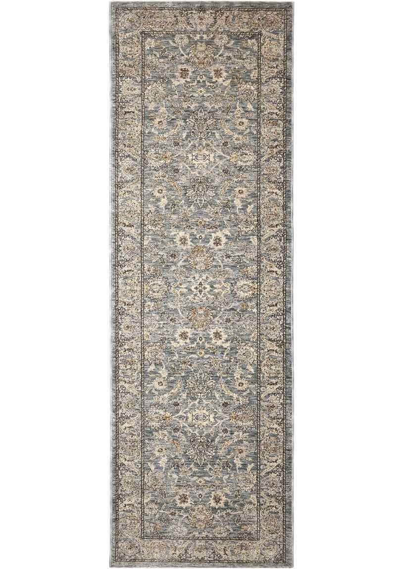 Elegant traditional rug with intricate floral patterns in soft blue and beige tones