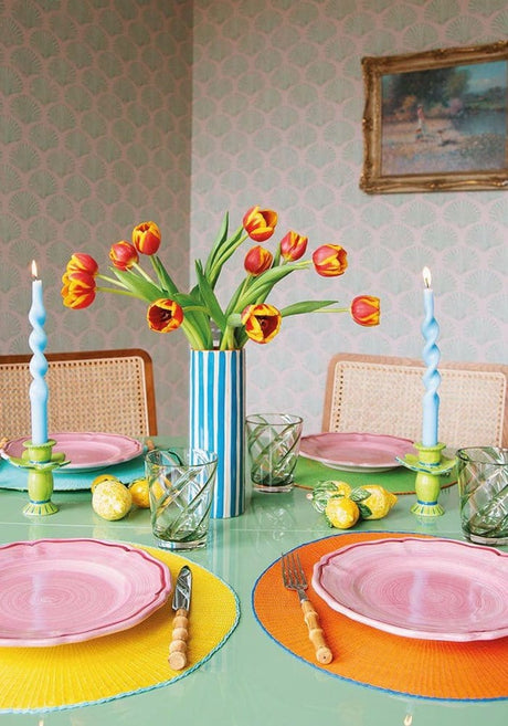 Casa by Josephine Jenno vibrant tumbler glasses on an elegantly set dining table with colourful plates