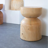 Natural wooden side table with a round design, perfect for modern home decor