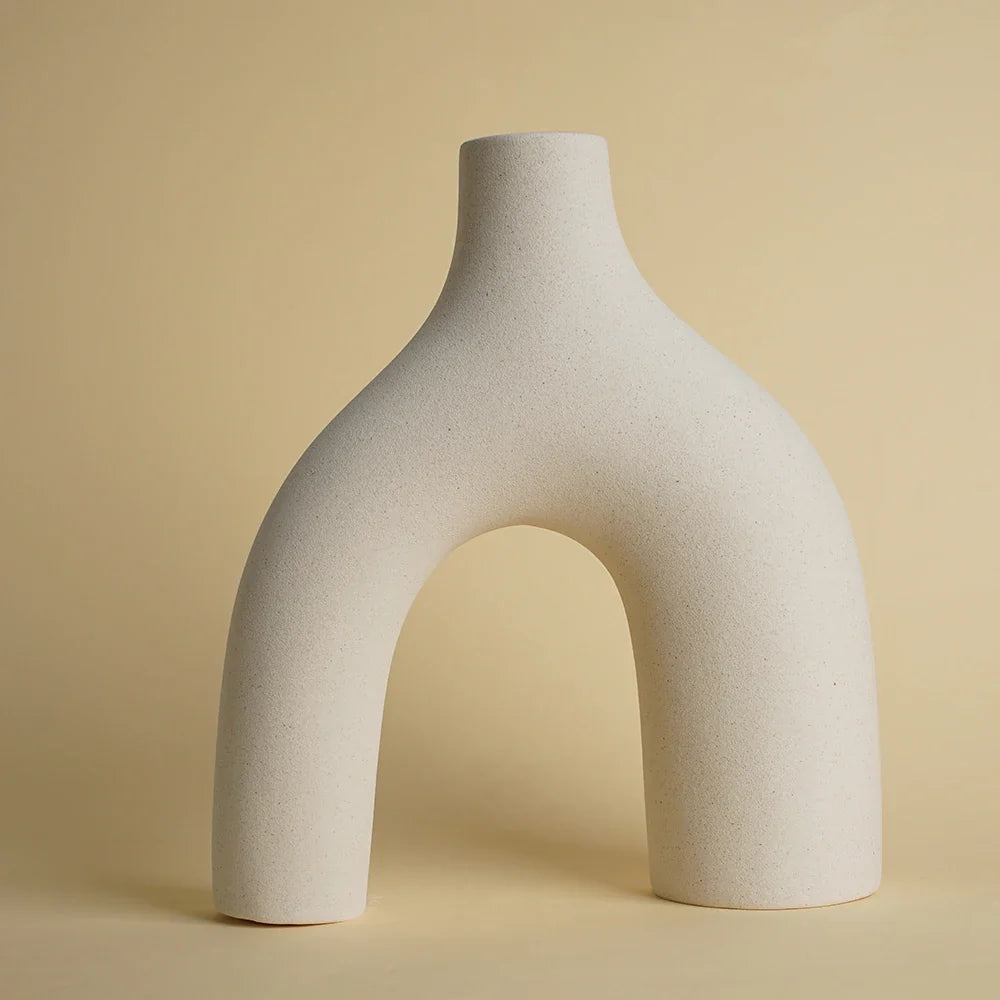 Elegant Nisu Home ceramic vase with unique arch shape for modern home decor