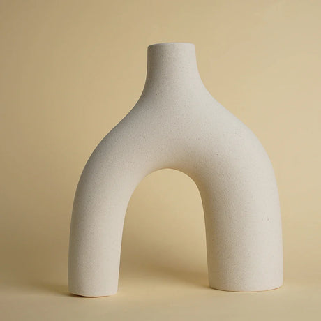 Elegant Nisu Home ceramic vase with unique arch shape for modern home decor