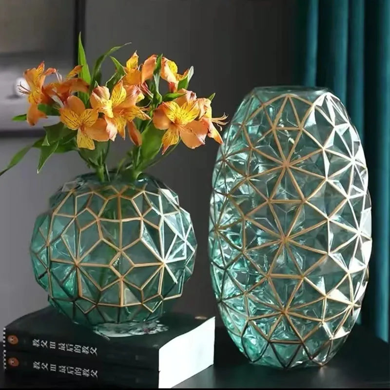 Unique geometric glass vase with gold accents, perfect for floral arrangements