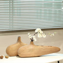 Nisu Home decorative vases with textured surfaces showcasing elegant floral arrangements