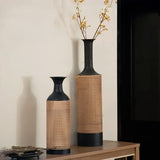 Elegant Nisu Home decorative vases in black and natural tones, perfect for floral arrangements