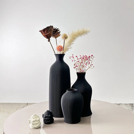 Elegant Nisu Home Black Vase Set with Unique Ribbed Design and Dried Flowers