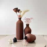 Elegant Nisu Home vase collection in terracotta with dried flowers for stylish home decor