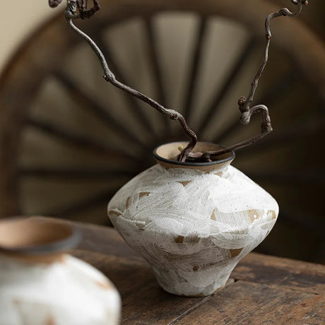 Handcrafted Nisu Home vase with a unique design, perfect for adding elegance to any decor