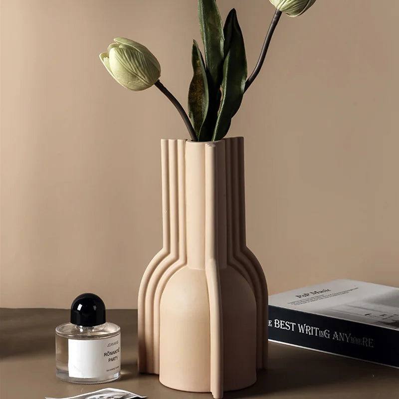 Modern Nisu Home Vase in Beige with Decorative Flowers on a Minimalist Surface